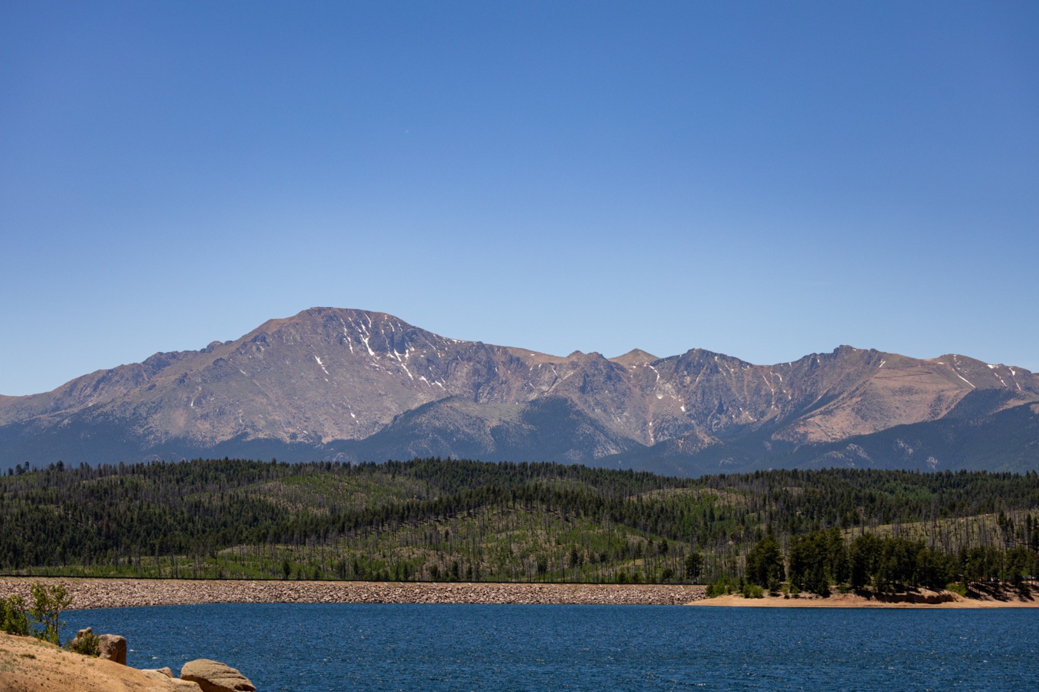 Mountain rising beyond a reservoir